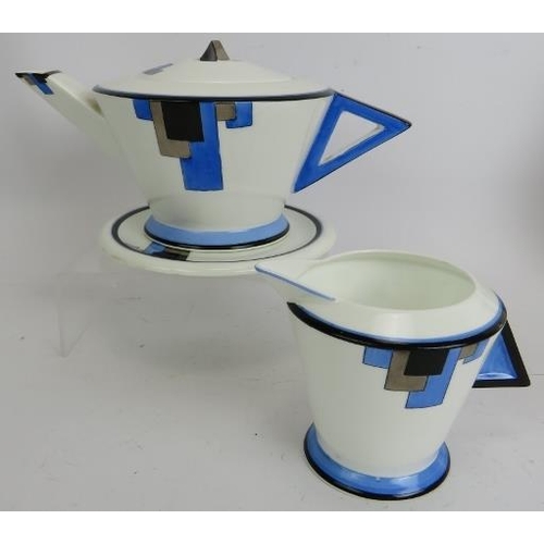 5 - A 19 piece Shelley blue block Art Deco tea set by Eric Slater, comprising tea pot and stand, jug, si... 