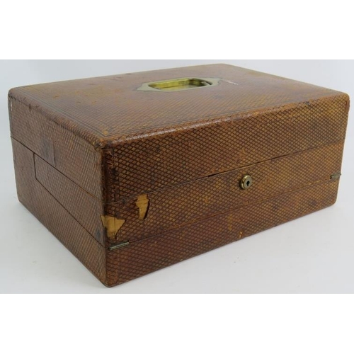 51 - A 19th century leather bound writing slope with brass fittings, Bramah lock and key, and fully fitte... 