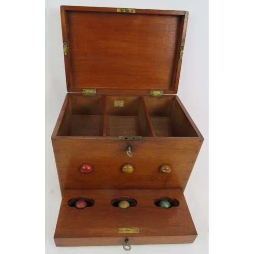 56 - An antique lotto type ball game consisting of box, numbered board and wooden balls. 27cm x 21cm x 18... 