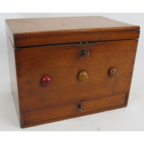 56 - An antique lotto type ball game consisting of box, numbered board and wooden balls. 27cm x 21cm x 18... 