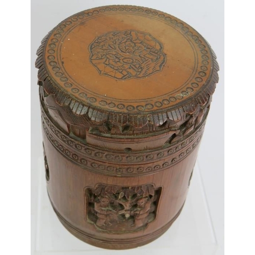 6 - A Chinese carved bamboo caddy jar and cover. Height 16cm. Diameter 12cm. 
Condition report: No issue... 