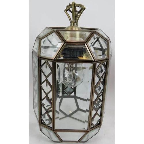 61 - A pair of hexagonal Arts and Crafts style modern ceiling lanterns with bevelled glass and amber bead... 