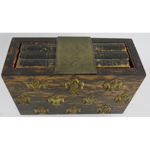 7 - A Victorian coromandel desk top book safe decorated with gilt brass fleur-de-lys and with engraved g... 