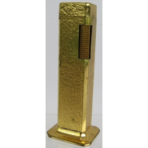 72 - A vintage gold plated Dunhill Tallboy table lighter. Height: 11cm.
Condition report: Some wear to pl... 