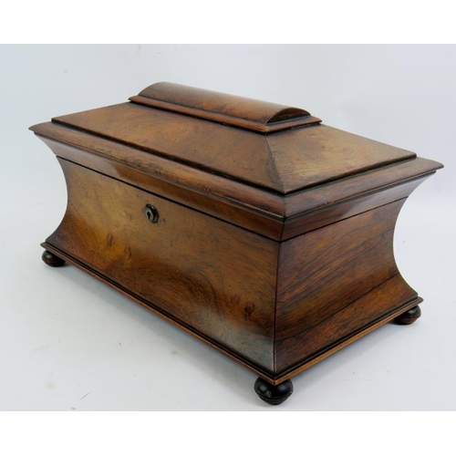 83 - A 19th century rosewood sarcophagus tea caddy of good size with internal fittings and Bramah lock. K... 