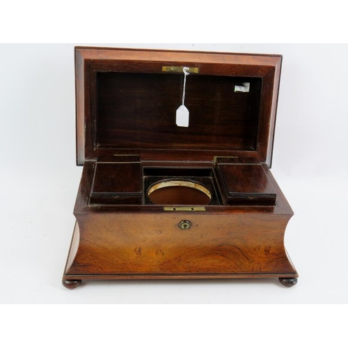 83 - A 19th century rosewood sarcophagus tea caddy of good size with internal fittings and Bramah lock. K... 