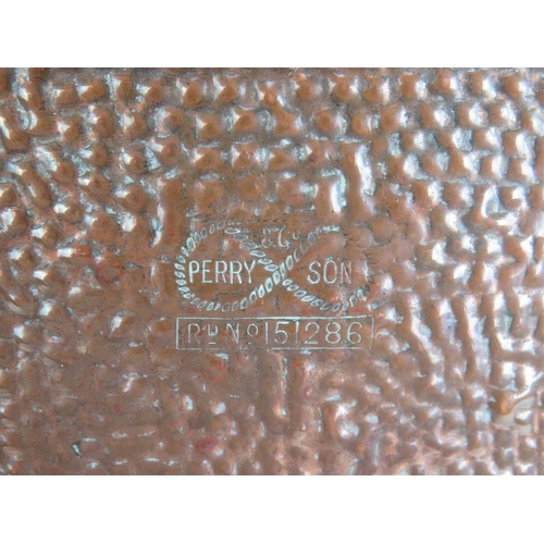 84 - A square copper Arts & Crafts dish with planished decoration and wavy rim. Stamped Perry Son & Co Re... 