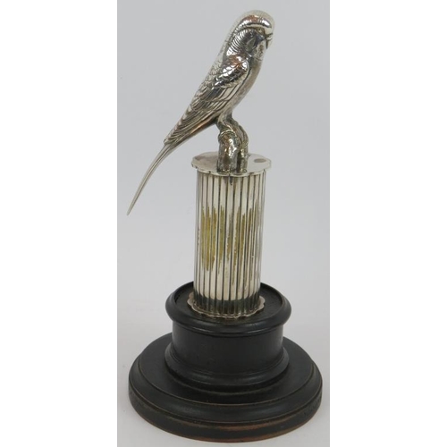 92 - A silver plated car mascot in the form of a Budgerigar perched on a column, circa 1920s, mounted on ... 