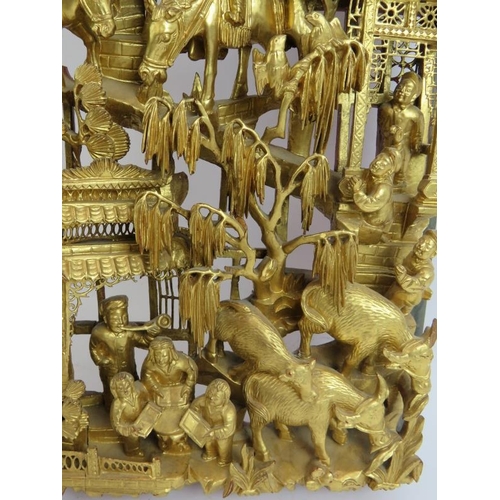 96 - A fine quality intricately carved Chinese Chaozhou giltwood carved panel of exquisite detail, from t... 