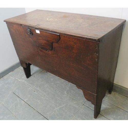 708 - A late 17th/early 18th century joined oak coffer, with internal candle box, on stile supports. 
Cond... 