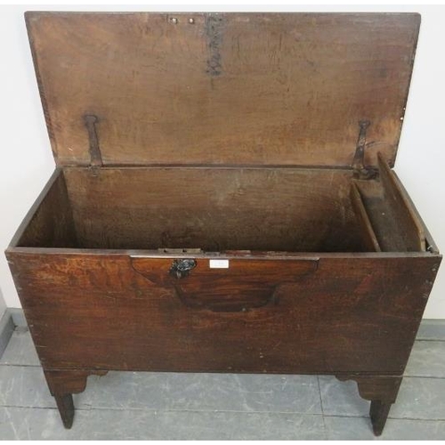 708 - A late 17th/early 18th century joined oak coffer, with internal candle box, on stile supports. 
Cond... 