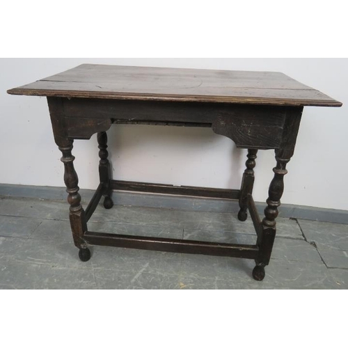 715 - A late 17th century oak side table in unrestored condition, with single drawer featuring original br... 