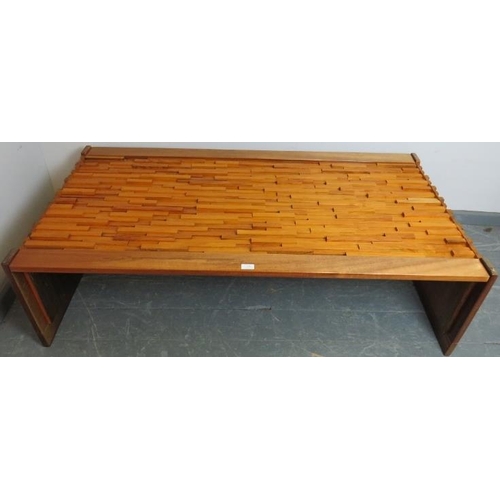 718 - A mid-century hardwood Brutalist coffee table by Percival Lafer (Brazilian, b. 1936) with loose glas... 