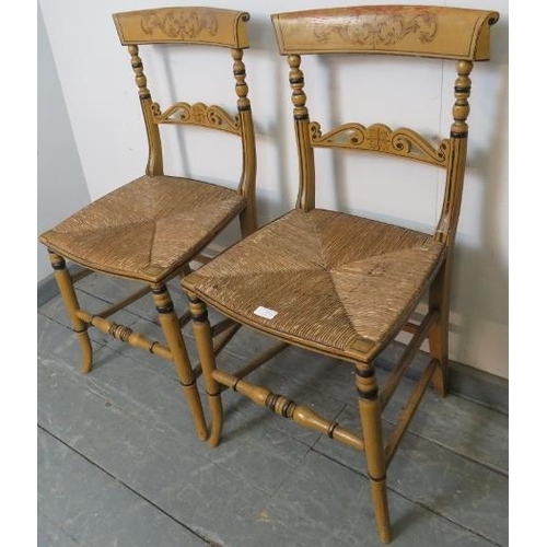 720 - A pair of Regency rush seated side chairs retaining the original polychrome yellow & black paintwork... 