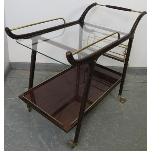 722 - A mid-century mahogany Italian drinks trolley/bar cart in the manner of Ico Parisi, with brass fitti... 