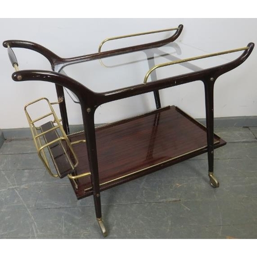 722 - A mid-century mahogany Italian drinks trolley/bar cart in the manner of Ico Parisi, with brass fitti... 