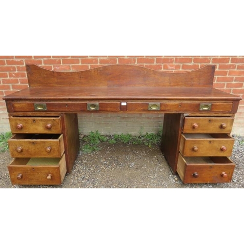 731 - A large 19th century mahogany pedestal sideboard/desk, the top with two long drawers fitted with twi... 