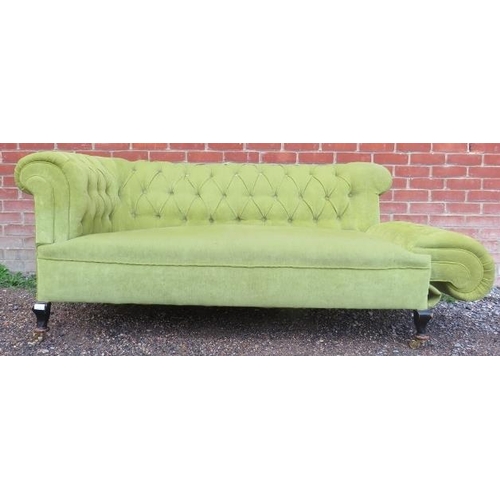 734 - An Edwardian chesterfield two-seater drop-end sofa, upholstered in a gold buttoned material, on ogee... 