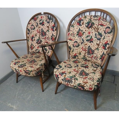 743 - A pair of vintage elm ‘Grandfather’ Windsor armchairs by Ercol (model 317) with loose seat cushions ... 