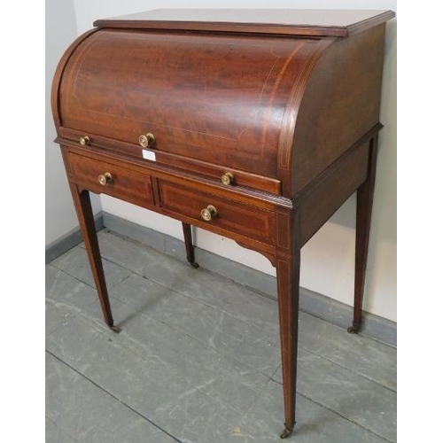 745 - An Edwardian mahogany Regency Revival cylinder top writing desk, featuring crossbanded inlay and str... 