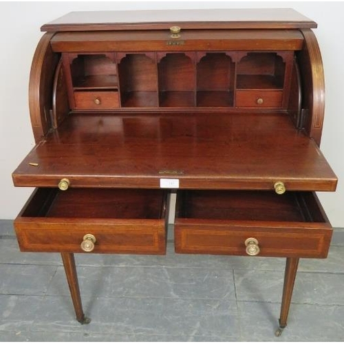 745 - An Edwardian mahogany Regency Revival cylinder top writing desk, featuring crossbanded inlay and str... 