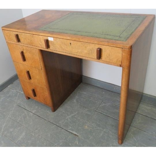 759 - An Art Deco figured walnut kneehole desk by Maple & Co with inset green leather tooled writing surfa... 