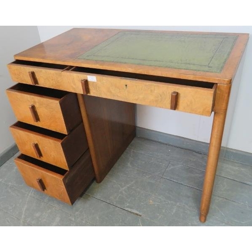 759 - An Art Deco figured walnut kneehole desk by Maple & Co with inset green leather tooled writing surfa... 