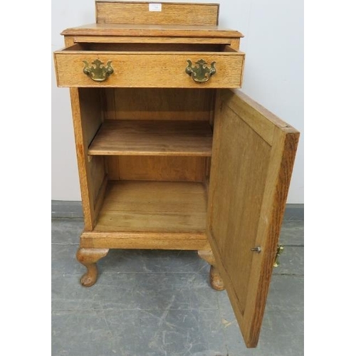 760 - An Edwardian light oak bedside cabinet with single cock-beaded drawer and cupboard under with loose ... 