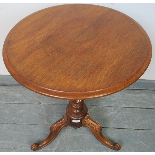 768 - A Victorian walnut circular wine table, on barley twist pedestal with acanthus carved and scrolled t... 