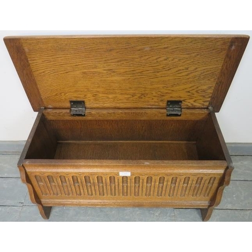 771 - A vintage medium oak coffer/blanket box in a 17th century taste, featuring carved arcaded front, on ... 