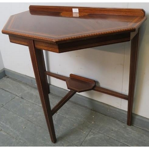 773 - An Edwardian mahogany console table strung with satinwood and featuring batwing inlay, on tapering s... 