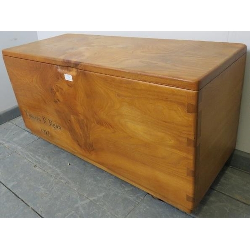 774 - A bespoke elm coffer/blanket box in the manner of Ercol, raised on castors. 
Condition report: No is... 