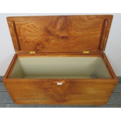 774 - A bespoke elm coffer/blanket box in the manner of Ercol, raised on castors. 
Condition report: No is... 