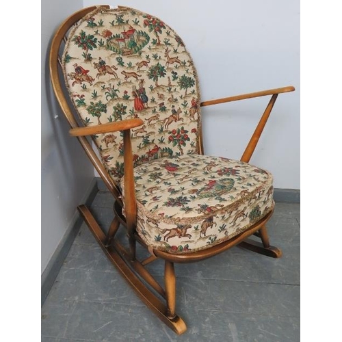 782 - A mid-century elm ‘grandfather’ Windsor rocking chair by Ercol (model 315) with loose cushions uphol... 