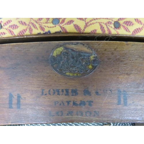 784 - An unusual Victorian bustle chair, with sliding extendable seat by Louis & Co Patent London, upholst... 