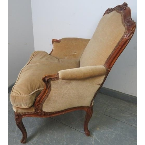 788 - A vintage French oak show-wood armchair, with acanthus carved frame, upholstered in beige draylon, o... 