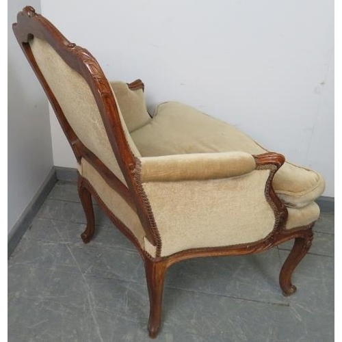 788 - A vintage French oak show-wood armchair, with acanthus carved frame, upholstered in beige draylon, o... 