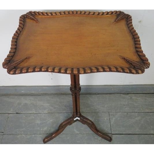 790 - An Edwardian walnut rectangular wine table featuring gadrooned edging and carved leaf decoration, on... 