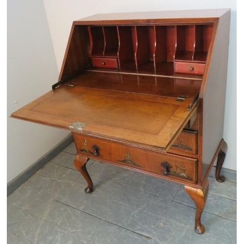 802 - A vintage walnut chinoiserie bureau, hand-painted and relief carved with oriental scenes, the fall-f... 