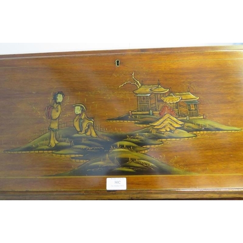 802 - A vintage walnut chinoiserie bureau, hand-painted and relief carved with oriental scenes, the fall-f... 