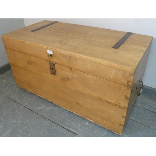 809 - An antique stripped pine flat top trunk/blanket box with cast iron strapwork hinges and handles to e... 