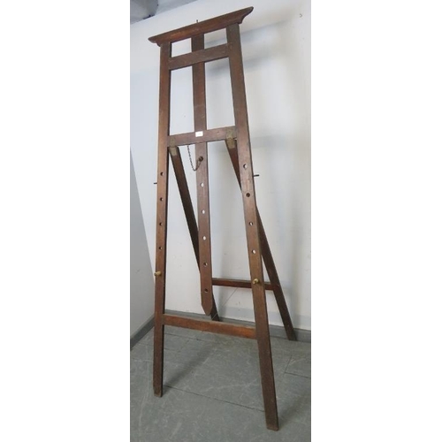 839 - A vintage oak folding artist’s easel with height adjustable pegs. 
Condition report: Minor marks con... 