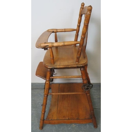 843 - A continental  beech and elm metamorphic child’s highchair, with painted backrest, on faux bamboo su... 