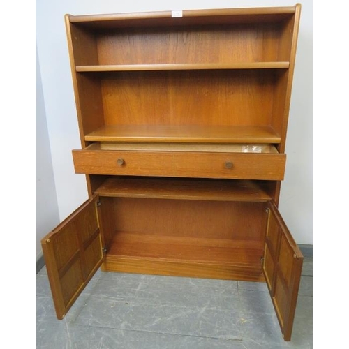 846 - A mid-century teak tall bookcase by Parker Knoll, with one long drawer and cupboard under, on a plin... 