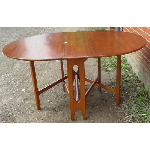 847 - A mid-century teak drop-leaf dining table. 
Condition report: No issues. 
H75cm W108cm D21cm-155cm (... 