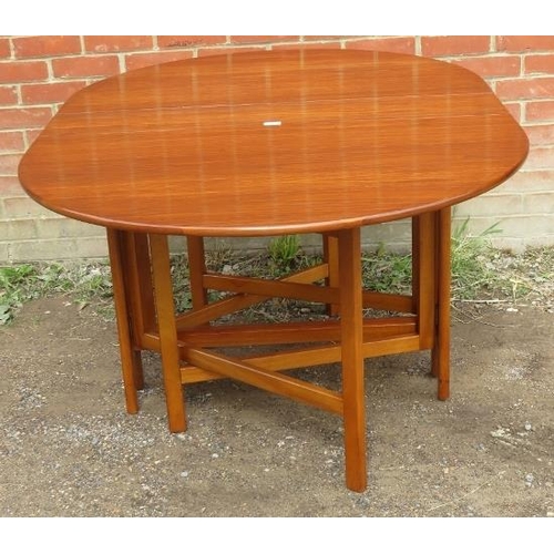 847 - A mid-century teak drop-leaf dining table. 
Condition report: No issues. 
H75cm W108cm D21cm-155cm (... 