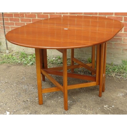 847 - A mid-century teak drop-leaf dining table. 
Condition report: No issues. 
H75cm W108cm D21cm-155cm (... 