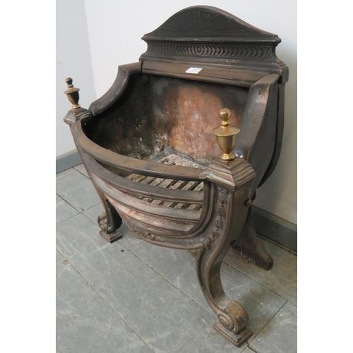 857 - An Edwardian cast iron freestanding fire basket featuring brass finials, with multi-fuel grate, on s... 