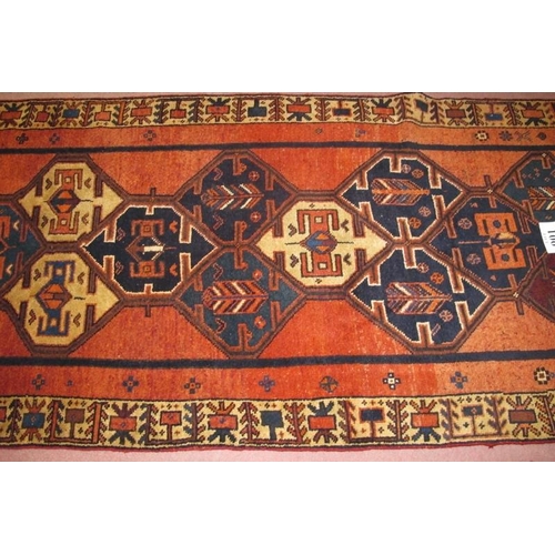 901 - A fine South West Persian Qashqai runner, central pattern on a burnt amber field and in very good co... 