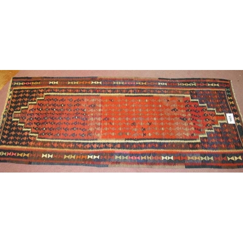 905 - A North West Persian Senneh Kilim rug, strong colours and in good condition. 2.18 x .90 metres.